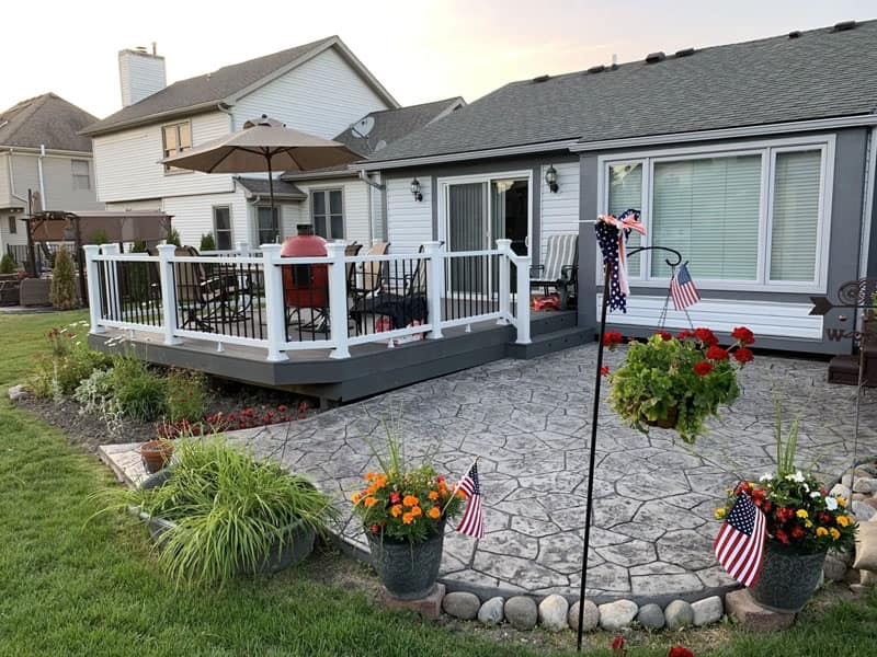 Completed deck and patio project at a home in the Commerce Township service area